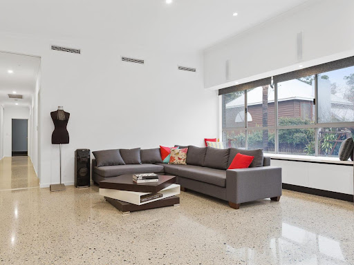 How Professional Concrete Grinding Services Can Improve Your Uneven Floors